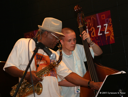 (Day Three) Saxophone legend Bobby Watson teaches a younger musician during a jam session at Jazz Central.